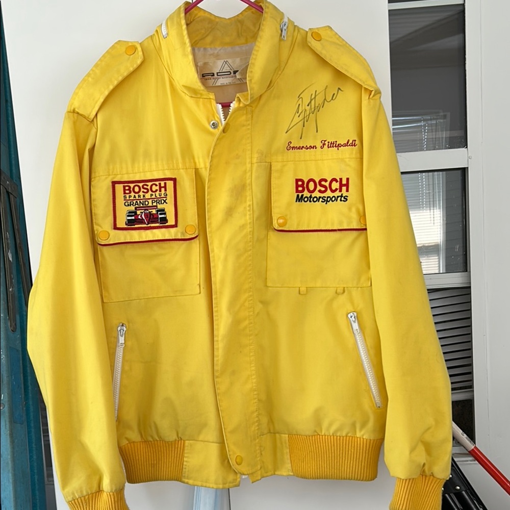 Collectible Emerson Fittipaldi worn & signed from Spark Plug Grand Prix
